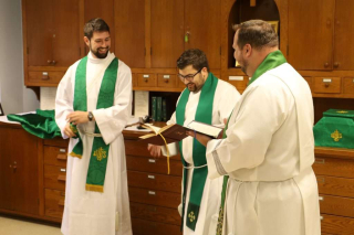 Fr. Isaac Longworth, CC preparing for Mass.