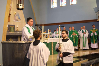 Fr. Mark Goring, CC preaching the Gospel and