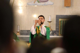 Fr. Isaac Longworth, CC during the Liturgy of the Eucharist.